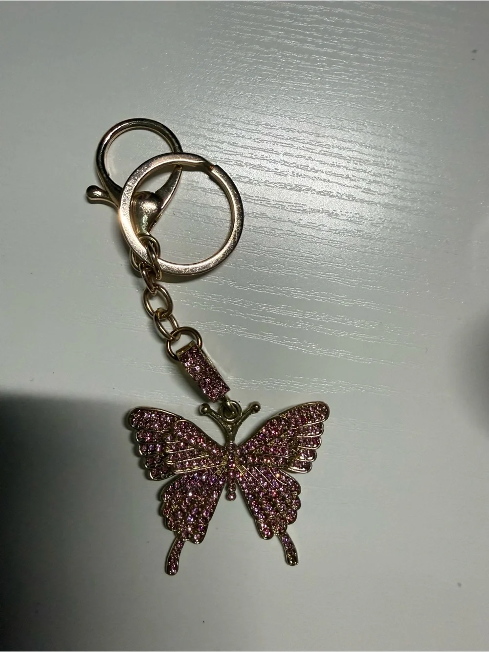 Sparkling Pink Butterfly Keyring with Gold Hardware